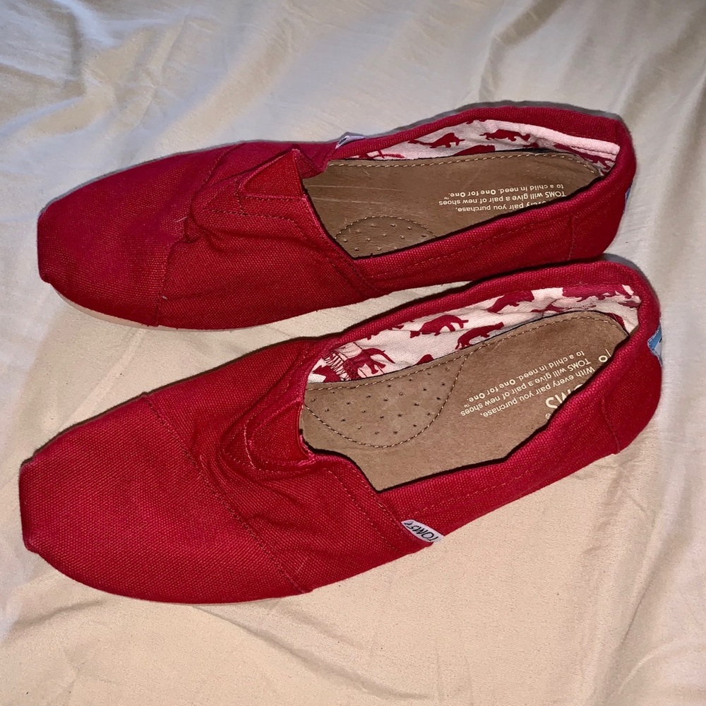 Toms red canvas slip on flats